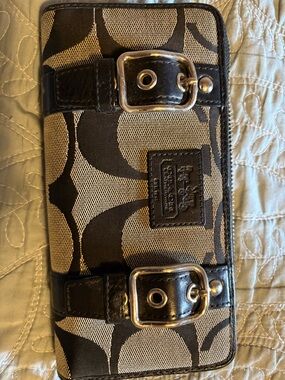 Coach Signature Canvas Bi-Fold Wallet in Black and Tan with Buckle Accents